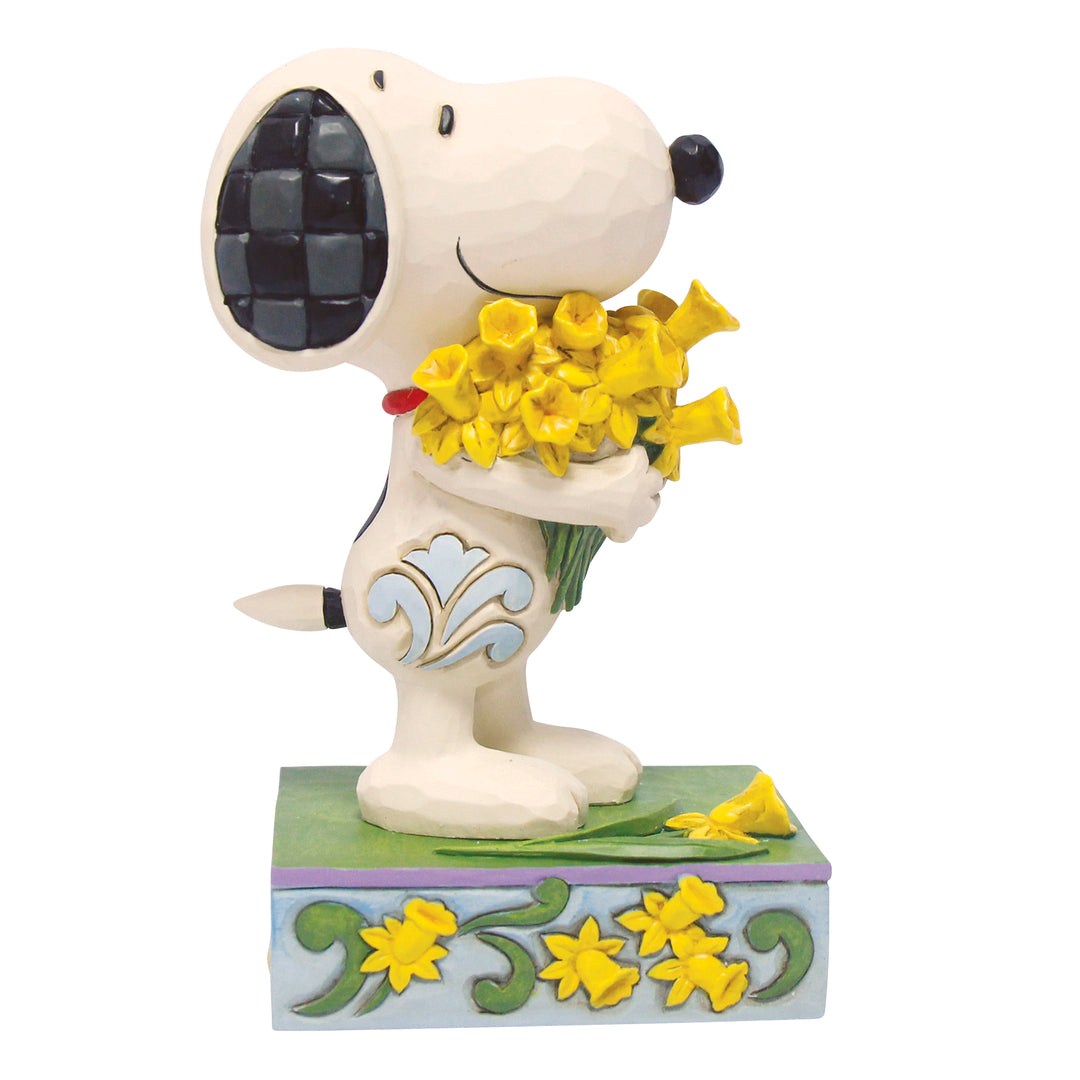 Jim Shore Peanuts: Snoopy With Bouquet of Daffodils Figurine sparkle-castle