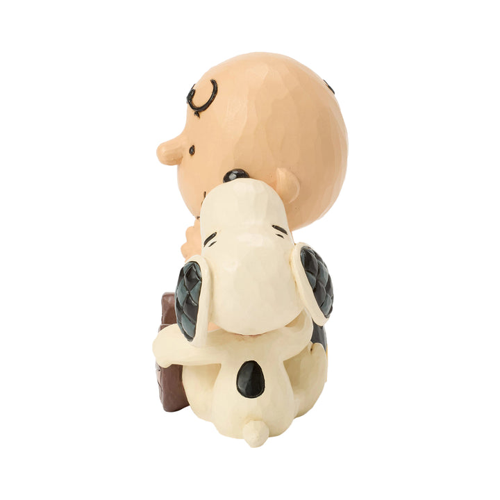 Jim Shore Peanuts: Snoopy Licking Charlie Brown's Cheek Figurine sparkle-castle