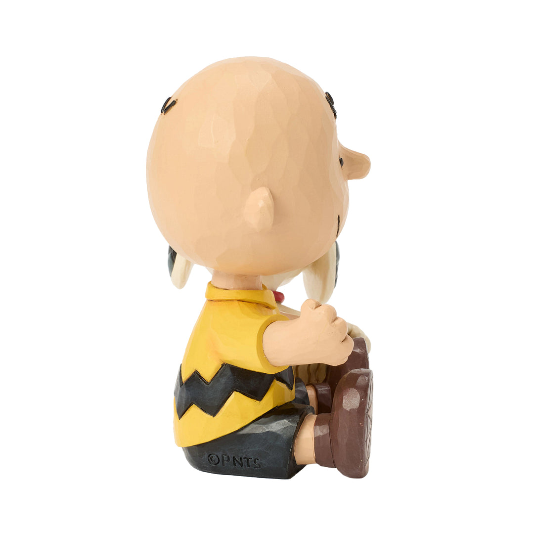 Jim Shore Peanuts: Snoopy Licking Charlie Brown's Cheek Figurine sparkle-castle