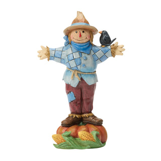 Jim Shore Heartwood Creek: Scarecrow Standing on Pumpkin Figurine sparkle-castle