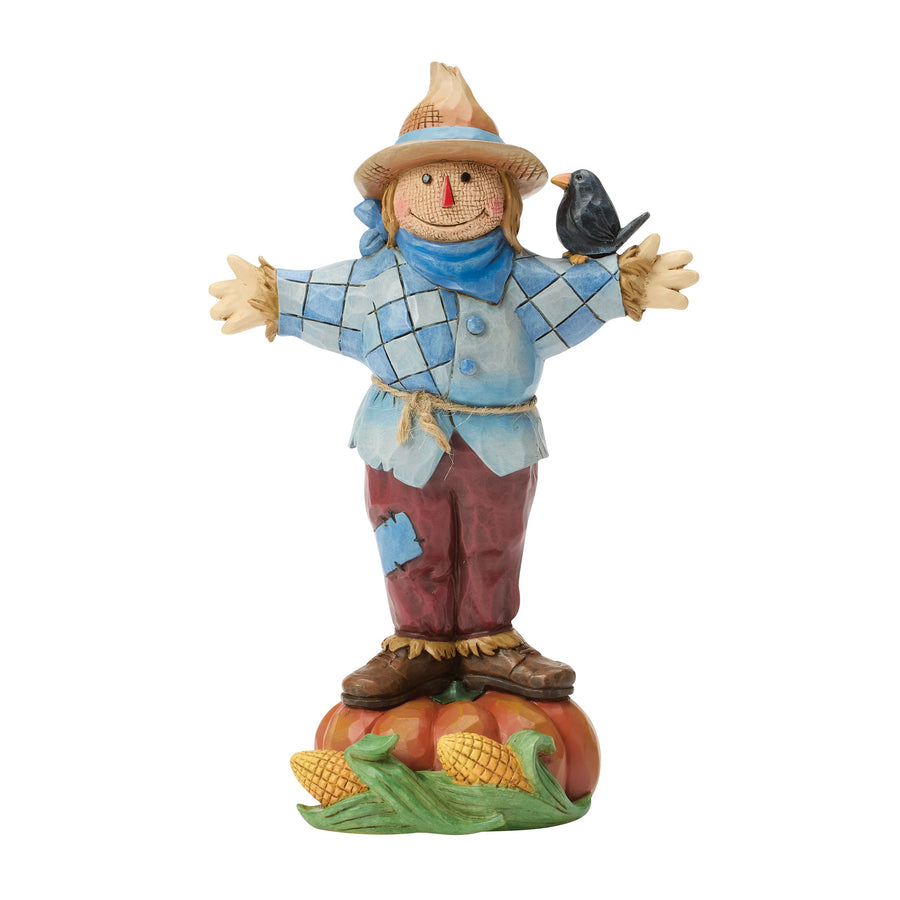 Jim Shore Heartwood Creek: Scarecrow Standing on Pumpkin Figurine sparkle-castle