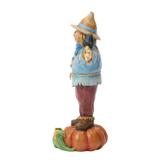 Jim Shore Heartwood Creek: Scarecrow Standing on Pumpkin Figurine sparkle-castle