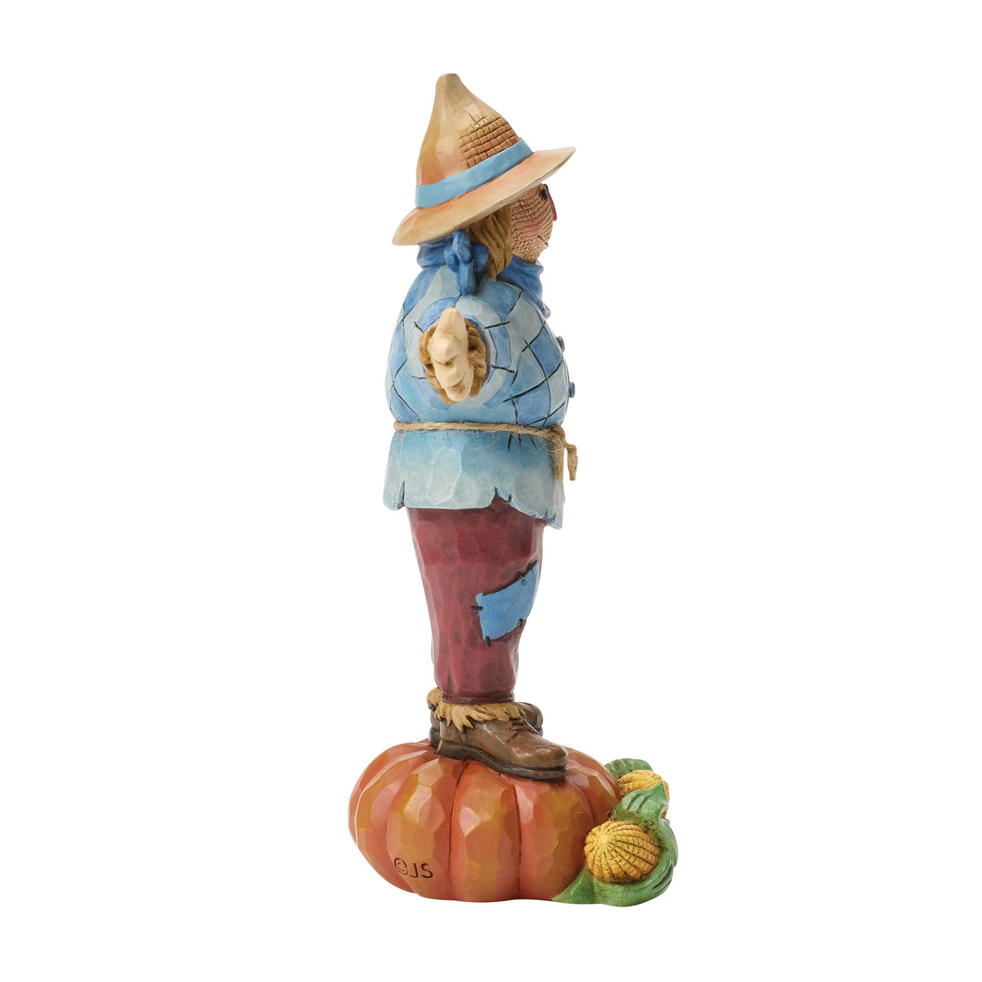 Jim Shore Heartwood Creek: Scarecrow Standing on Pumpkin Figurine sparkle-castle
