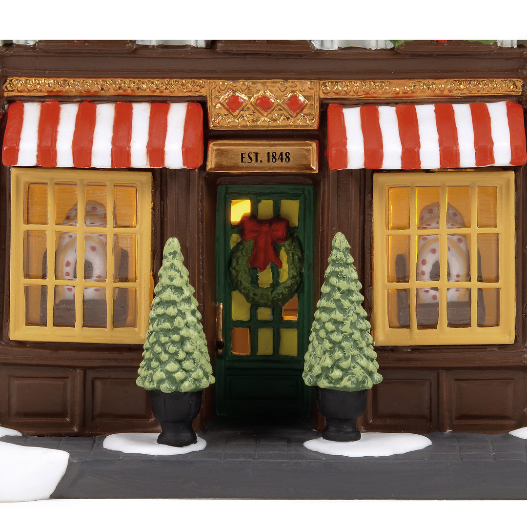 Department 56 Christmas In The City Village: Chris' Kringles sparkle-castle