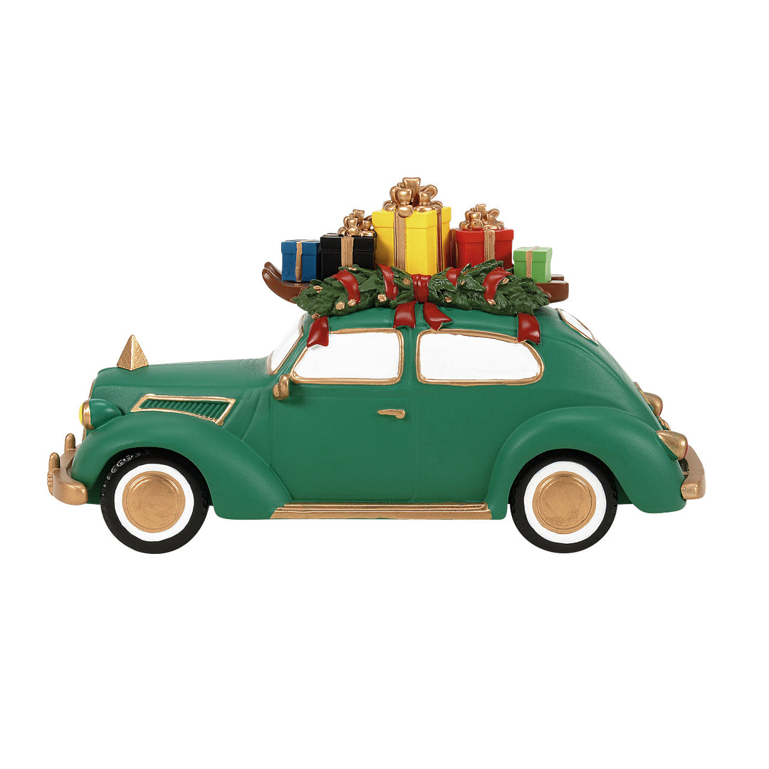 Department 56 Christmas In The City Village Accessory: Bringing Home Christmas 2026 sparkle-castle