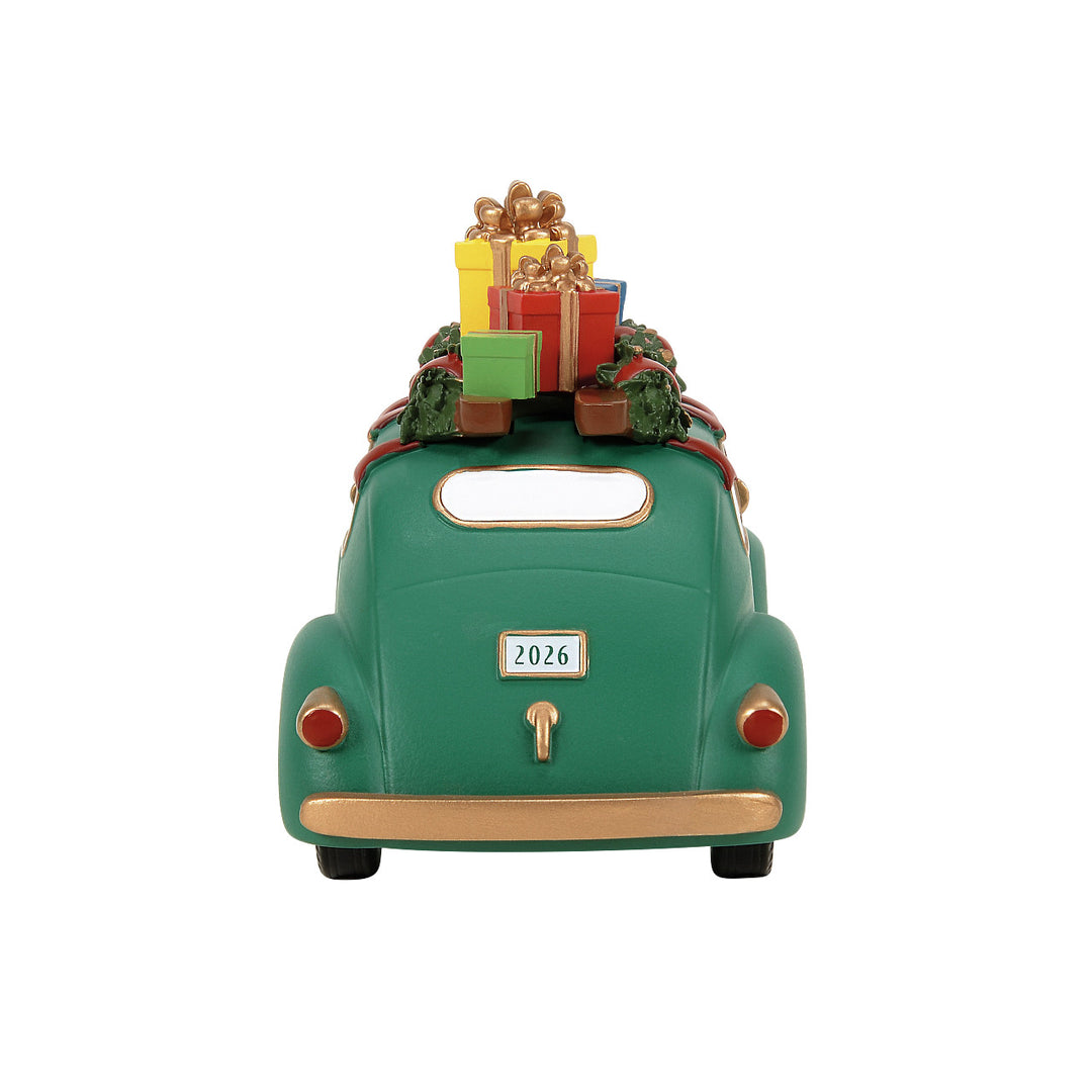 Department 56 Christmas In The City Village Accessory: Bringing Home Christmas 2026 sparkle-castle