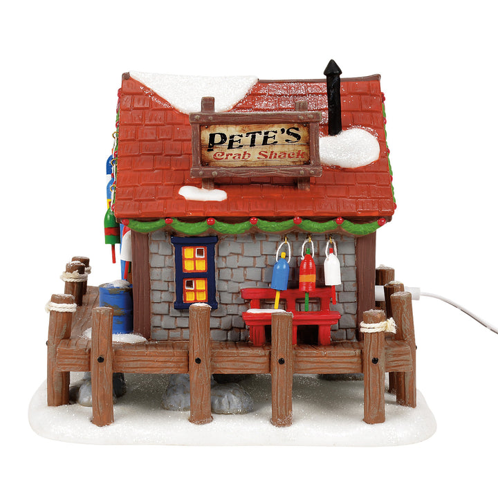 Department 56 Disney Snow Village: Pete's Crabby Christmas sparkle-castle