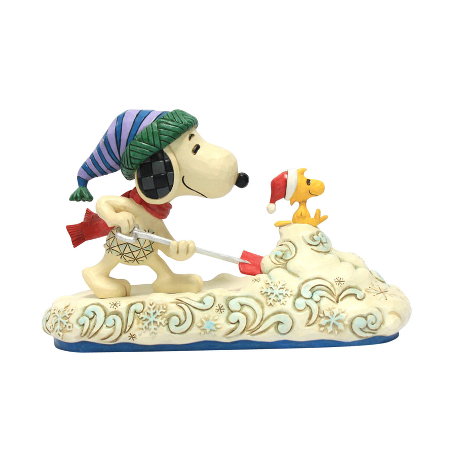 Jim Shore Peanuts: Snoopy Shoveling Snow Figurine sparkle-castle