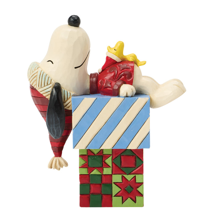 Jim Shore Peanuts: Snoopy & Woodstock Laying On Gifts Figurine sparkle-castle
