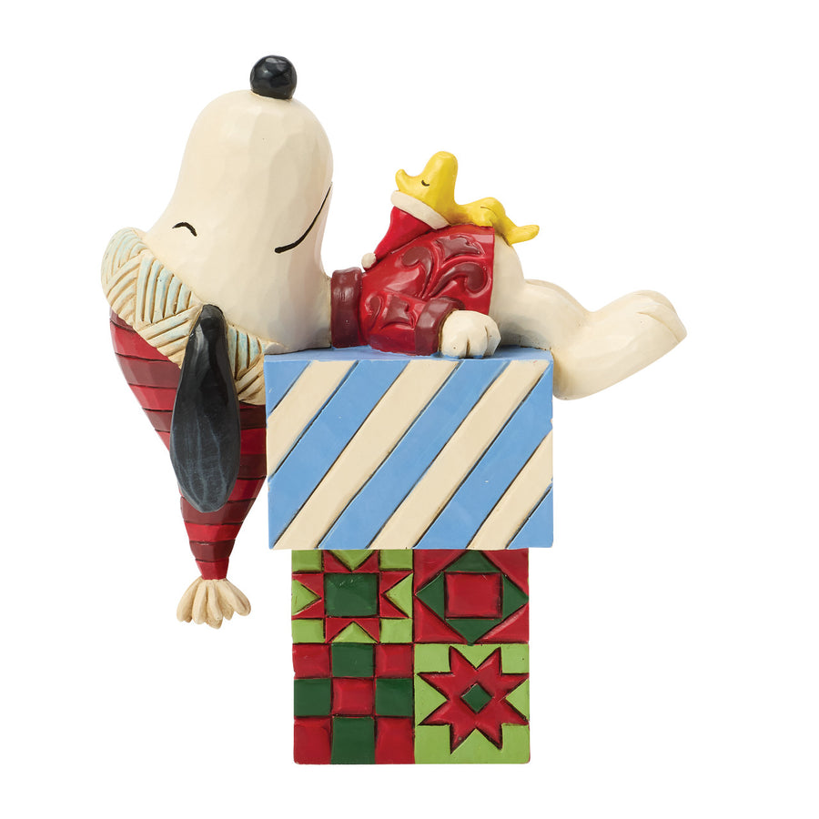 Jim Shore Peanuts: Snoopy & Woodstock Laying On Gifts Figurine sparkle-castle