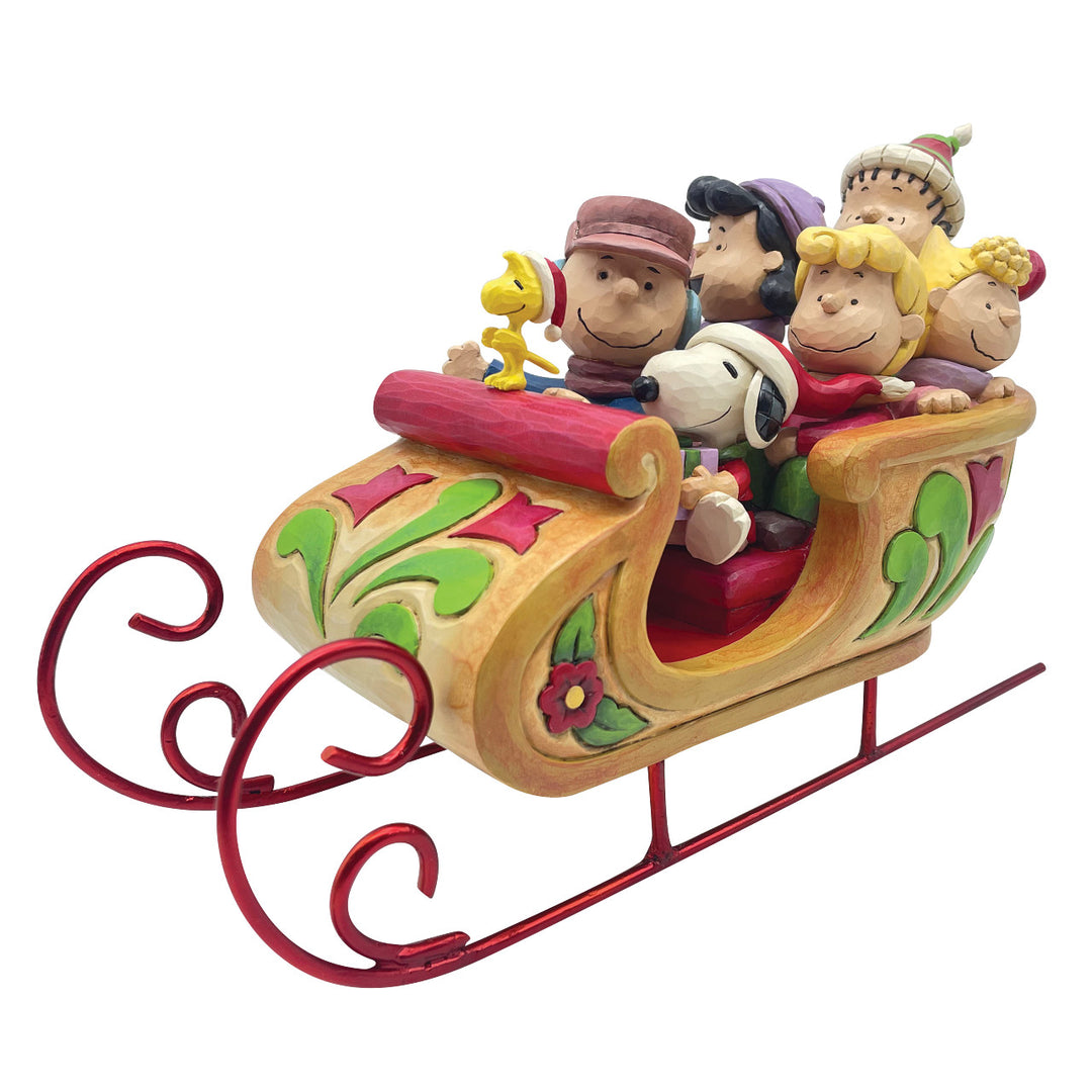 Jim Shore Peanuts: Snoopy and Friends in Sleigh Figurine sparkle-castle