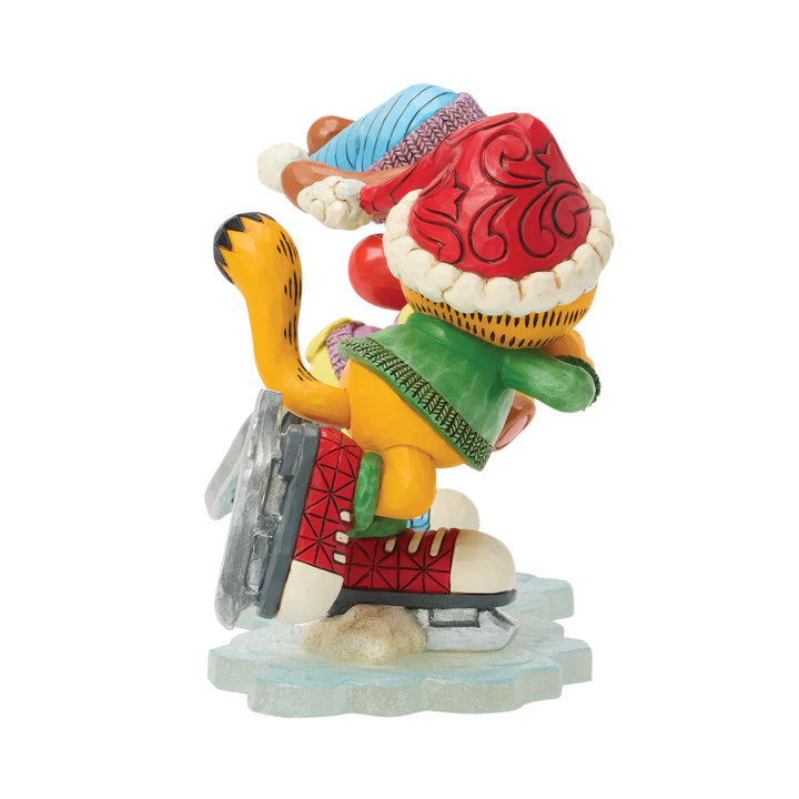 Jim Shore Garfield: Garfield, Odie, and Pooky Ice Skating Figurine sparkle-castle