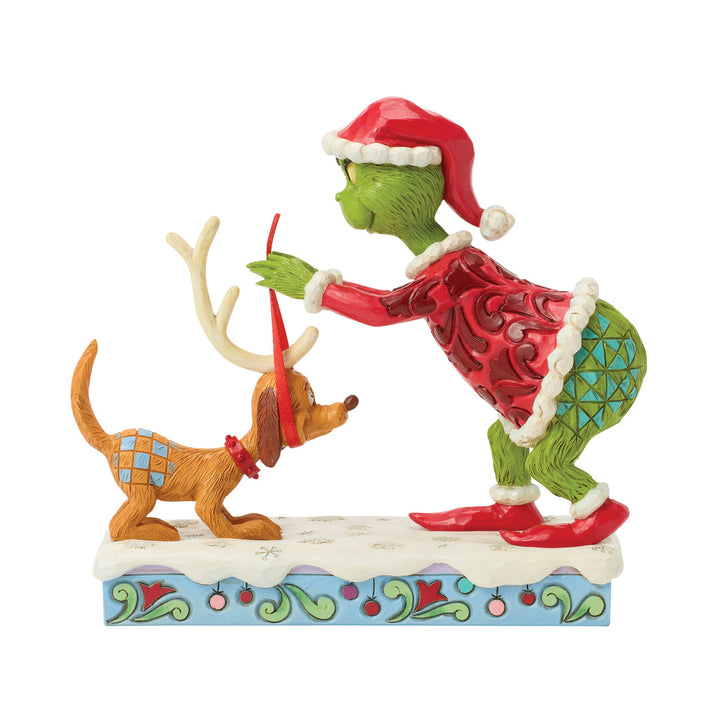 Jim Shore The Grinch: Grinch Tying Antlers On Max Figurine sparkle-castle