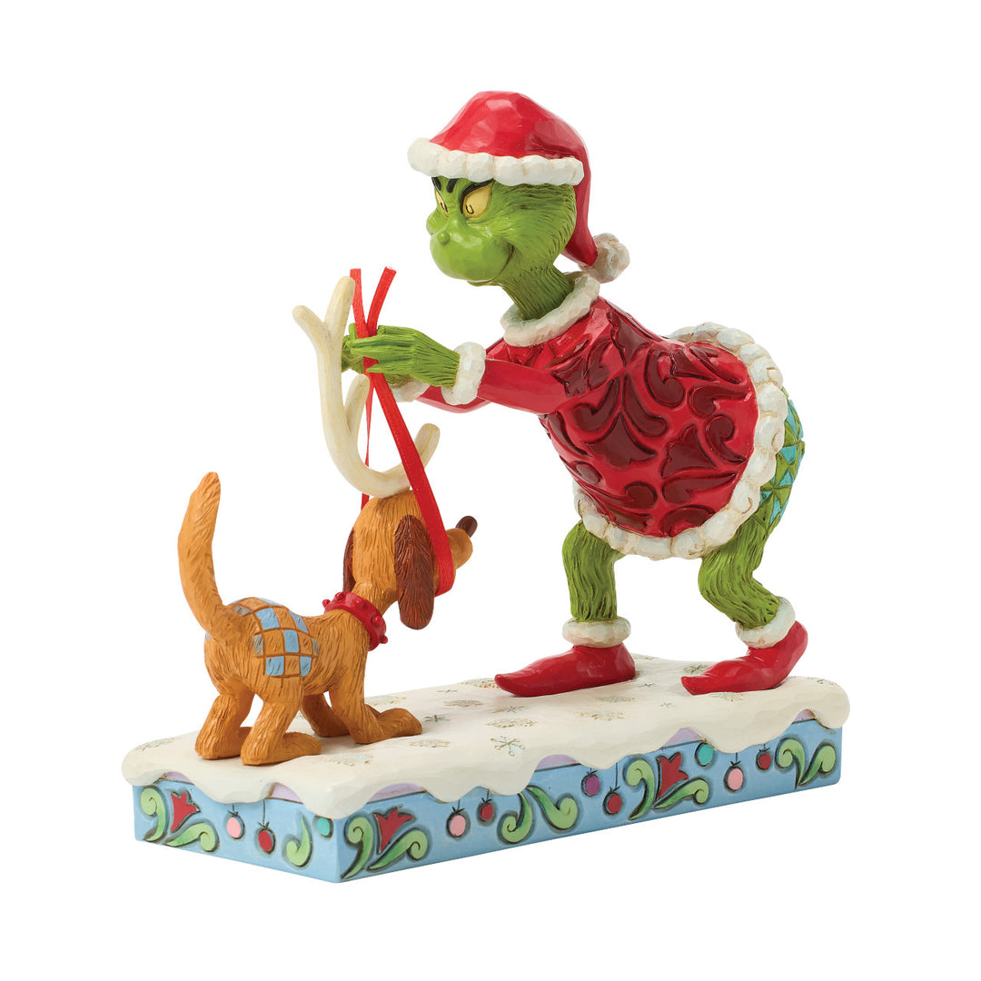 Jim Shore The Grinch: Grinch Tying Antlers On Max Figurine sparkle-castle