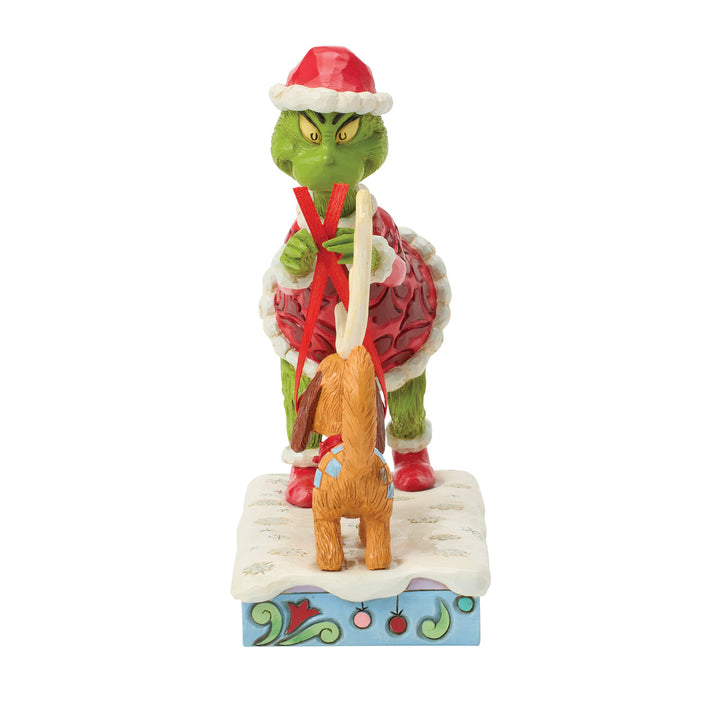 Jim Shore The Grinch: Grinch Tying Antlers On Max Figurine sparkle-castle