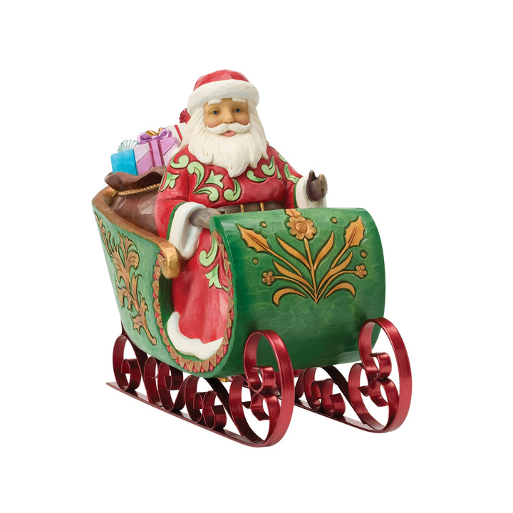 Jim Shore Heartwood Creek: Santa in Musical Sleigh Figurine sparkle-castle
