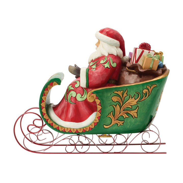 Jim Shore Heartwood Creek: Santa in Musical Sleigh Figurine sparkle-castle