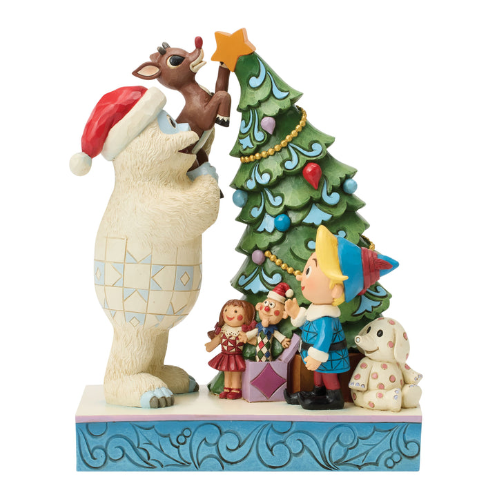 Jim Shore Rudolph Traditions: Bumble Holding Rudolph by Tree Figurine sparkle-castle