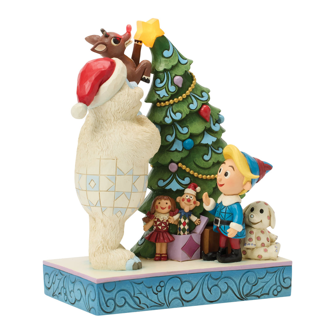Jim Shore Rudolph Traditions: Bumble Holding Rudolph by Tree Figurine sparkle-castle