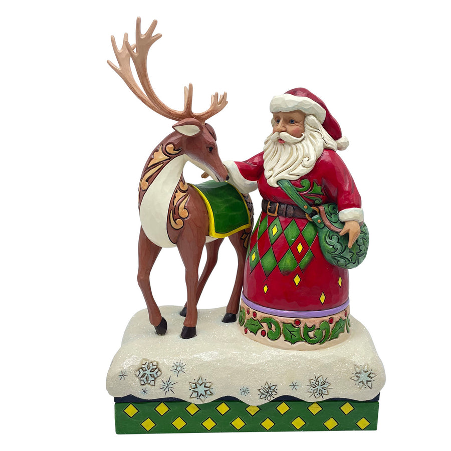 Jim Shore John Deere: Santa Petting Reindeer Wearing John Deere Blanket Figurine sparkle-castle