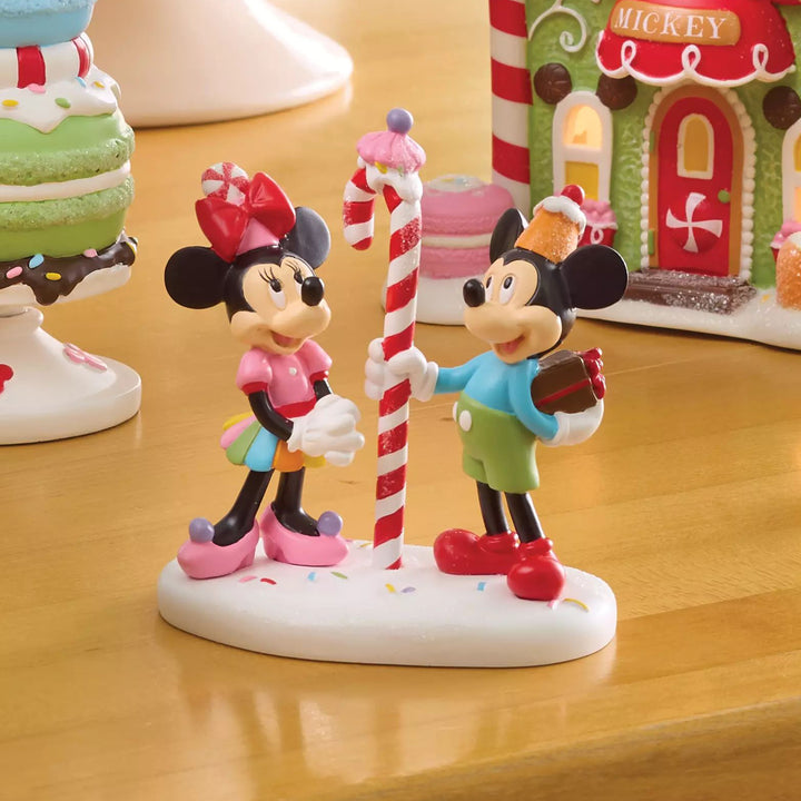 Department 56 Disney Snow Village Accessory: Mickey & Minnie Share A Treat sparkle-castle