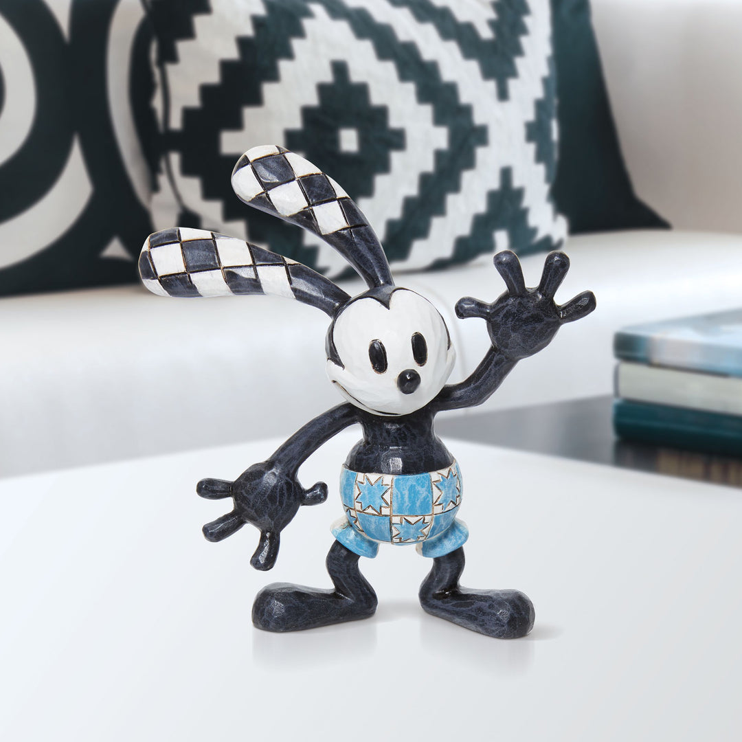 Jim Shore Disney Traditions: Mini Oswald Figurine sparkle-castle