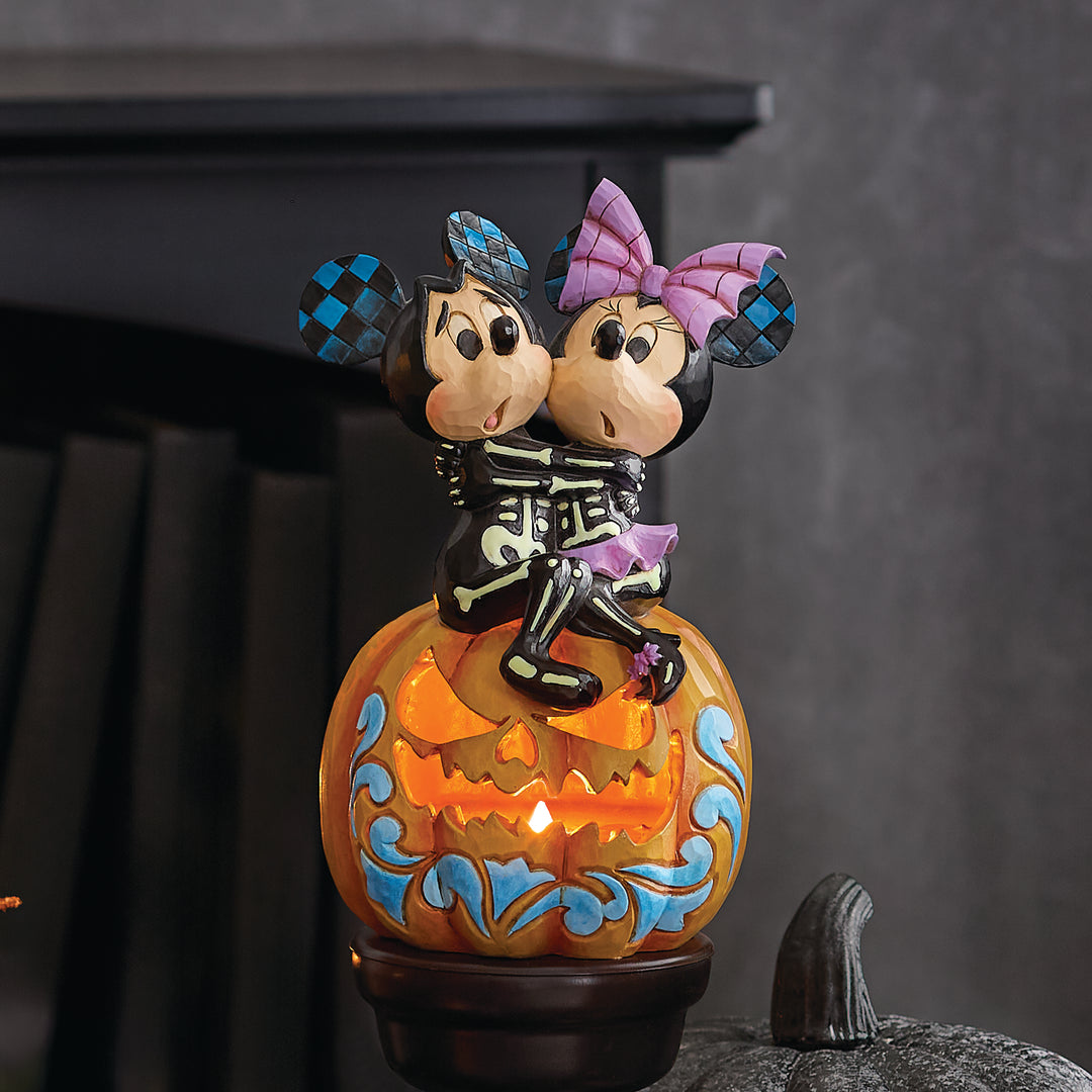 Jim Shore Disney Traditions: Skeletons Mickey & Minnie on Lit Jack-o-Lantern Figurine sparkle-castle