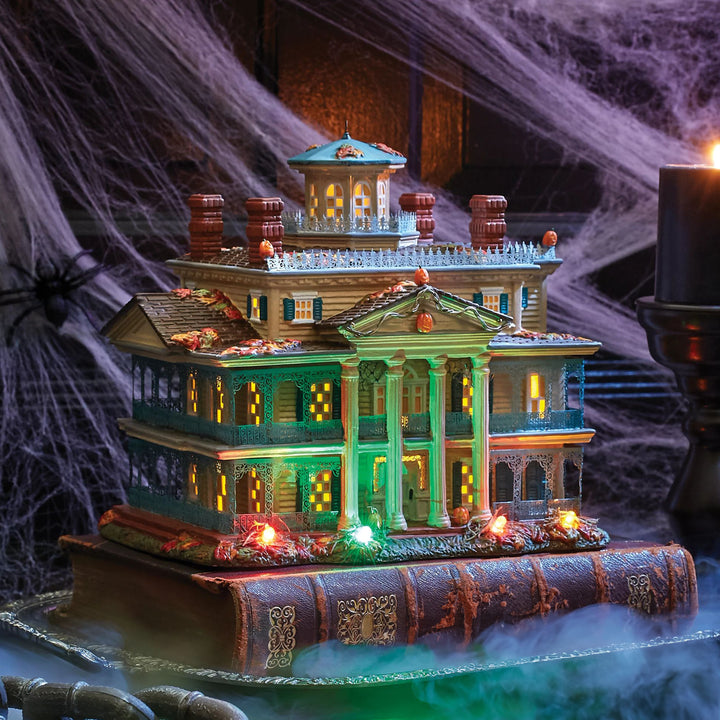 Department 56 Disney Snow Village Halloween: Disneyland Haunted Mansion sparkle-castle