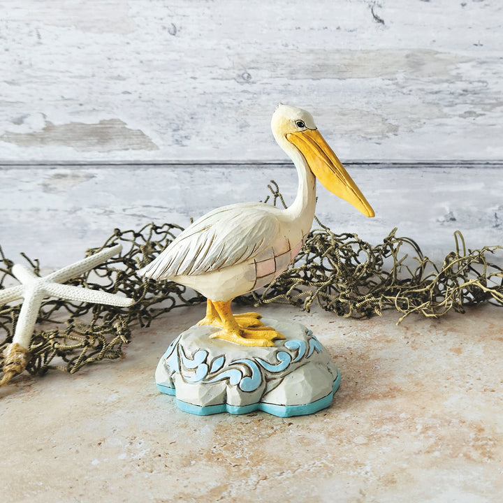 Jim Shore Heartwood Creek: Coastal Pelican Figurine sparkle-castle