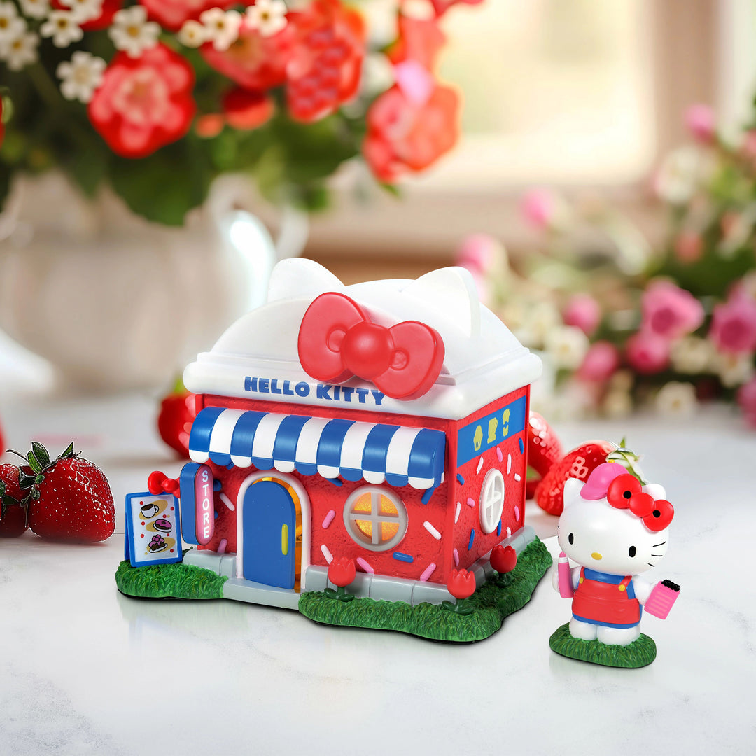 Department 56 Sanrio Hello Kitty Village: Hello Kitty's Store, Set of 2 sparkle-castle