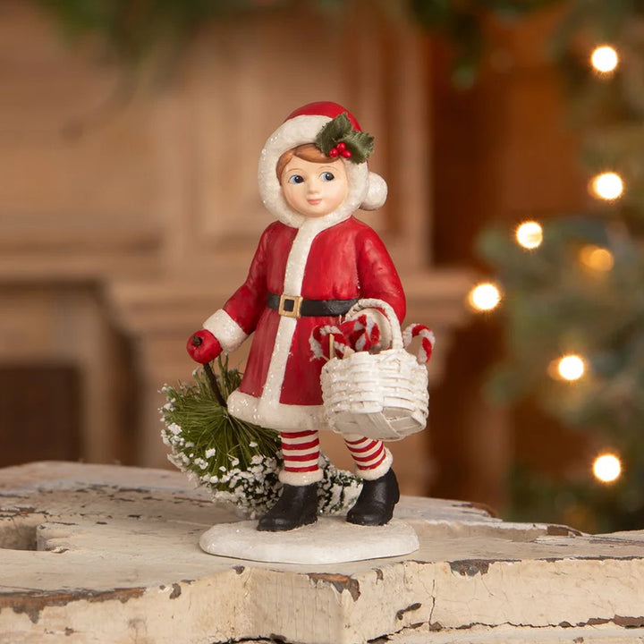 Bethany Lowe: Santa Girl Pulling Tree Figurine sparkle-castle