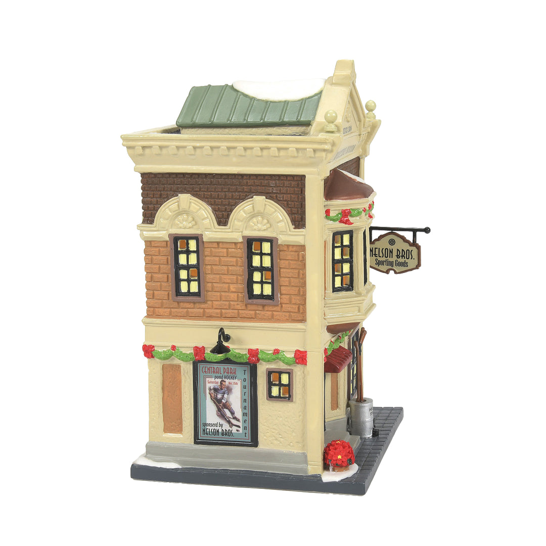 Department 56 Christmas in the City Village: Nelson Bros. Sporting Goods sparkle-castle