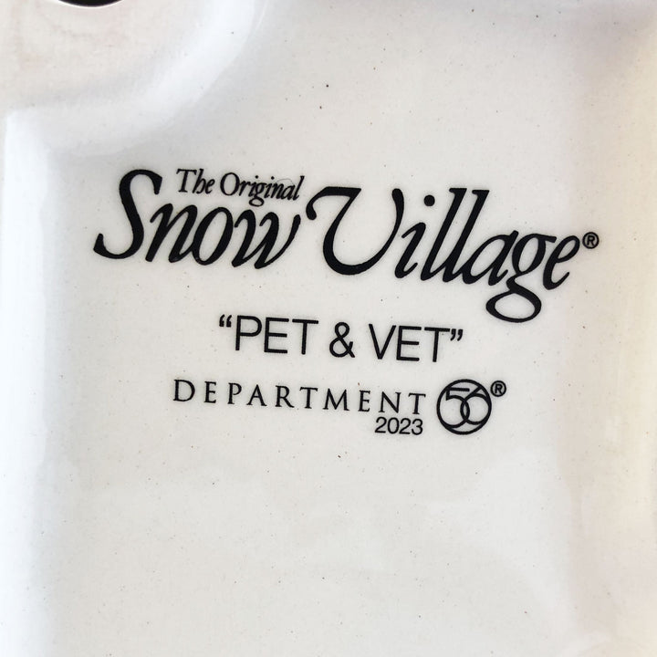 Department 56 Original Snow Village: Pet & Vet sparkle-castle