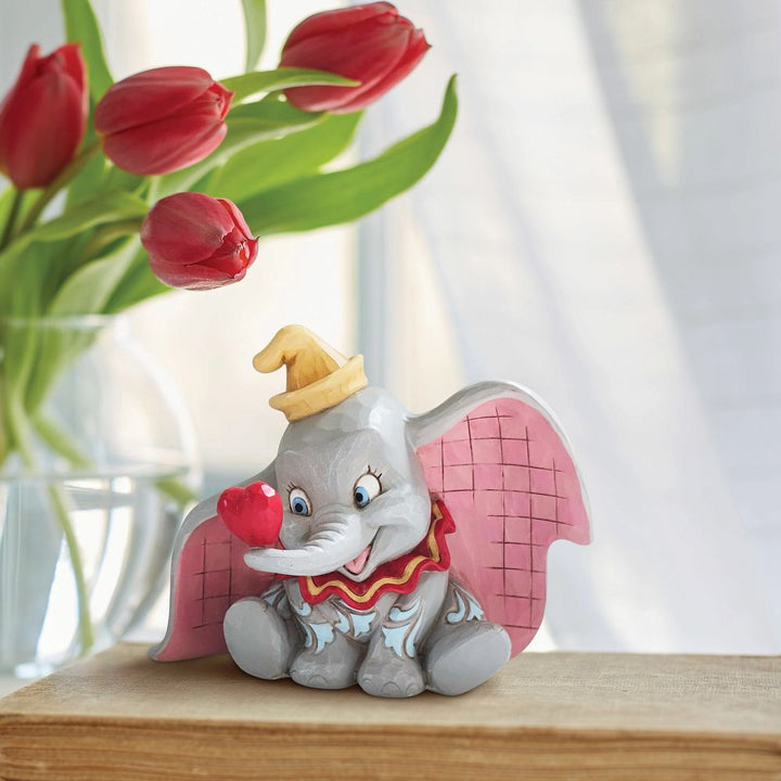 Jim Shore Disney Traditions: Dumbo with Heart Figurine sparkle-castle