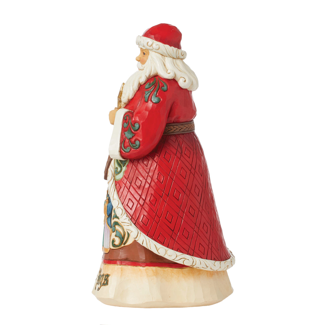 Jim Shore Heartwood Creek: 17th Annual Caroling Santa Figurine sparkle-castle