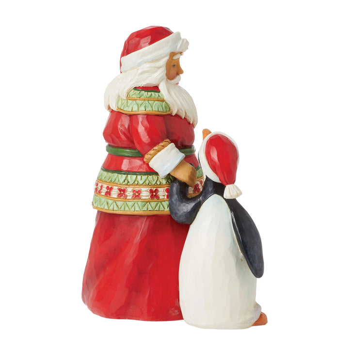 Jim Shore Heartwood Creek: Pint Sized Santa with Penguin Figurine sparkle-castle