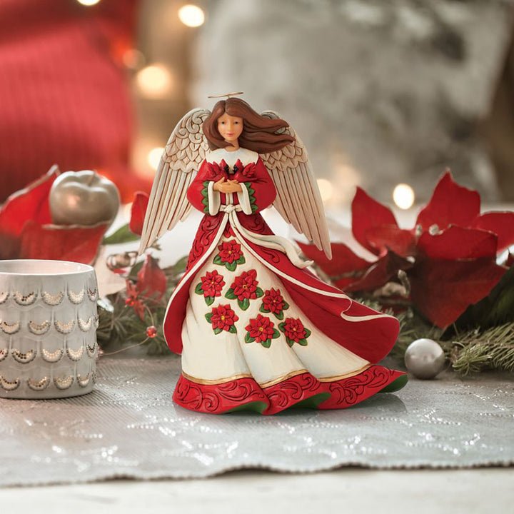 Jim Shore Heartwood Creek: Red Christmas Angel Figurine sparkle-castle