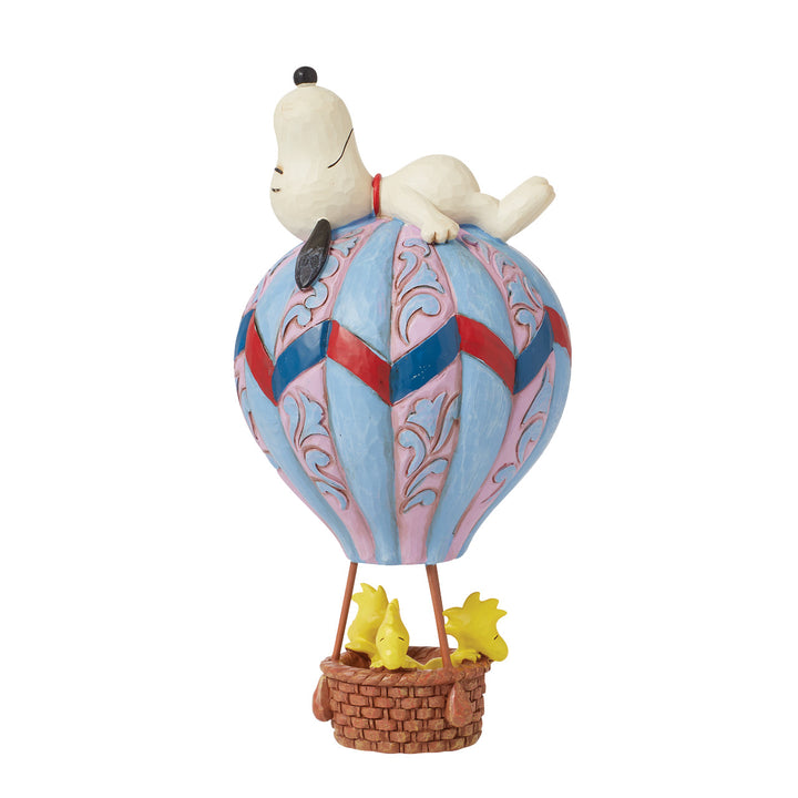 Jim Shore Peanuts: Snoopy Laying on Hot Air Balloon Figurine sparkle-castle