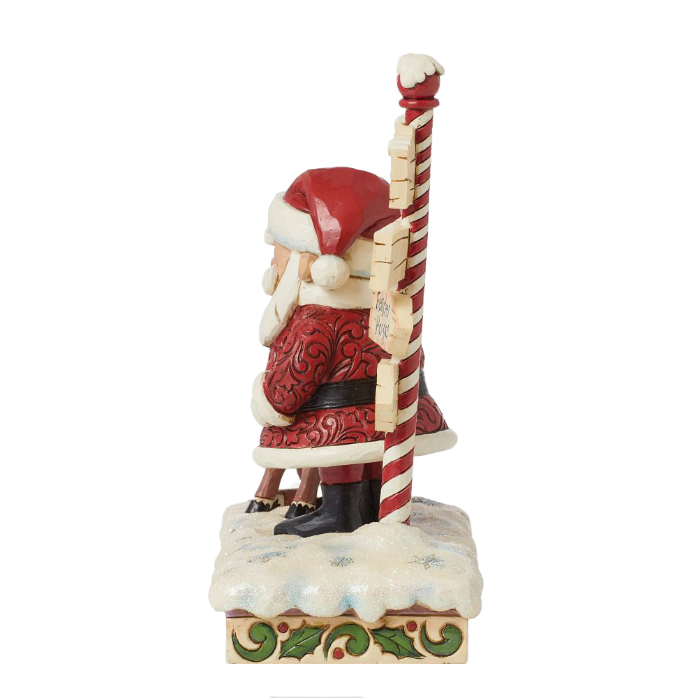 Jim Shore Rudolph Traditions: Rudolph and Santa Next to Sign Figurine sparkle-castle