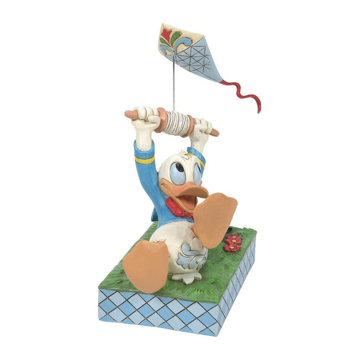 Jim Shore Disney Traditions: Donald With Kite Figurine sparkle-castle