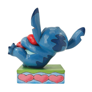 Jim Shore Disney Traditions: Stitch Hugging Heart Figurine sparkle-castle