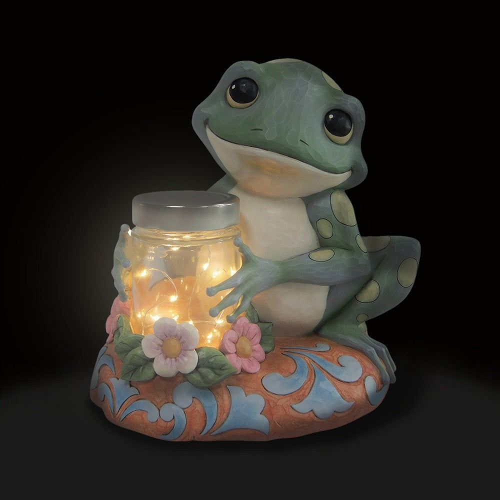 Jim Shore Heartwood Creek: Frog With Jar of Fireflies Figurine sparkle-castle