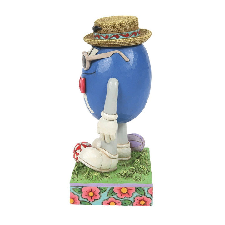 Jim Shore M&M'S: Blue M&M Wearing Easter Hat, Sunglasses and Bowtie Figurine sparkle-castle