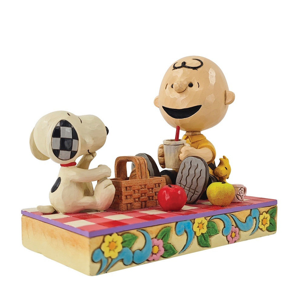 Jim Shore Peanuts: Snoopy, Charlie Brown & Woodstock On Picnic Figurine sparkle-castle