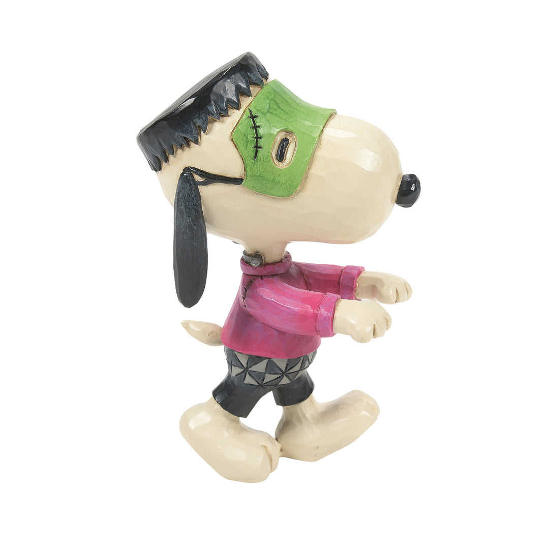 Jim Shore Peanuts: Snoopy Green Monster Mini Figurine