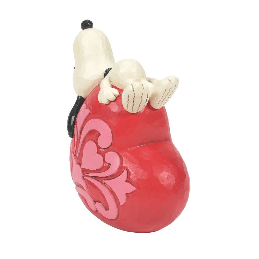 Jim Shore Peanuts: Snoopy Laying On Heart Figurine sparkle-castle