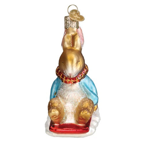 Old World Christmas: Peter Rabbit On Sled Hanging Ornament sparkle-castle