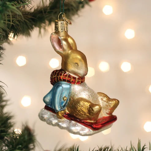 Old World Christmas: Peter Rabbit On Sled Hanging Ornament sparkle-castle