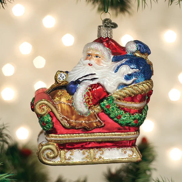 Old World Christmas: Santa In Sleigh Hanging Ornament sparkle-castle