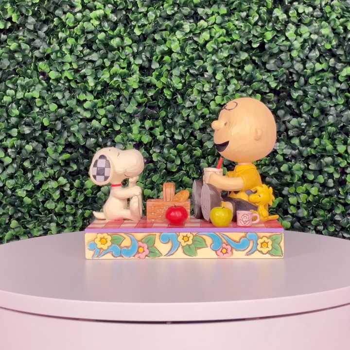 Jim Shore Peanuts: Snoopy, Charlie Brown & Woodstock On Picnic Figurine